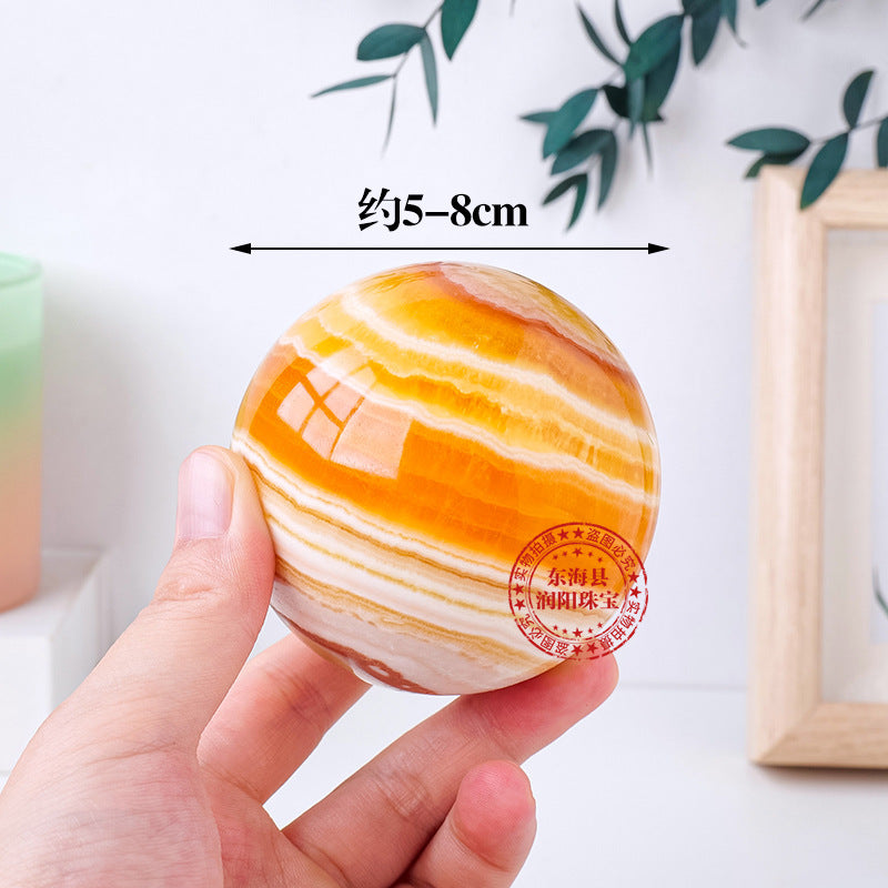 Natural yellow calcite crystal ball